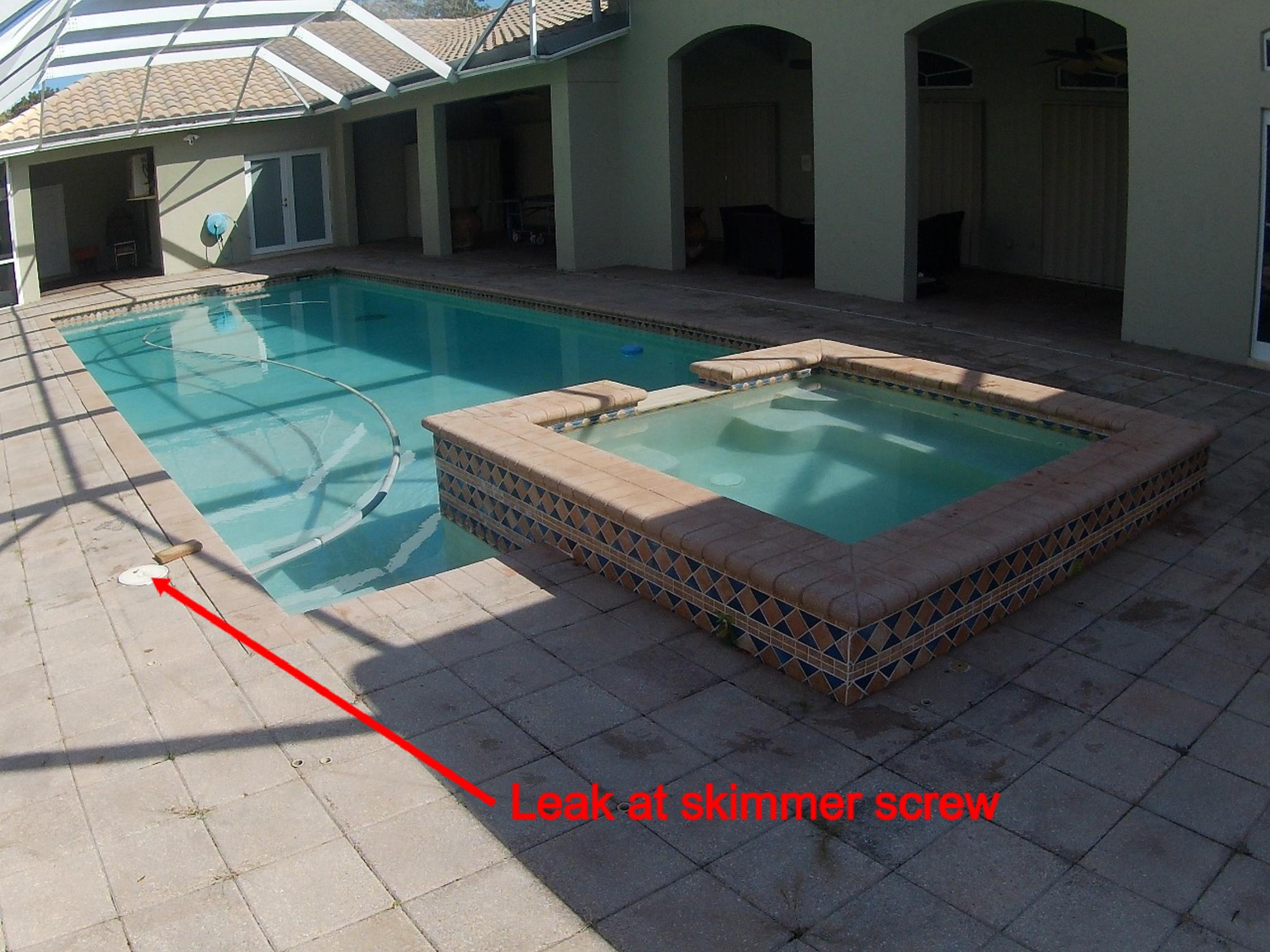Pool diagram marking a leak at the skimmer mounting screw in an Atlantis pool evaluation