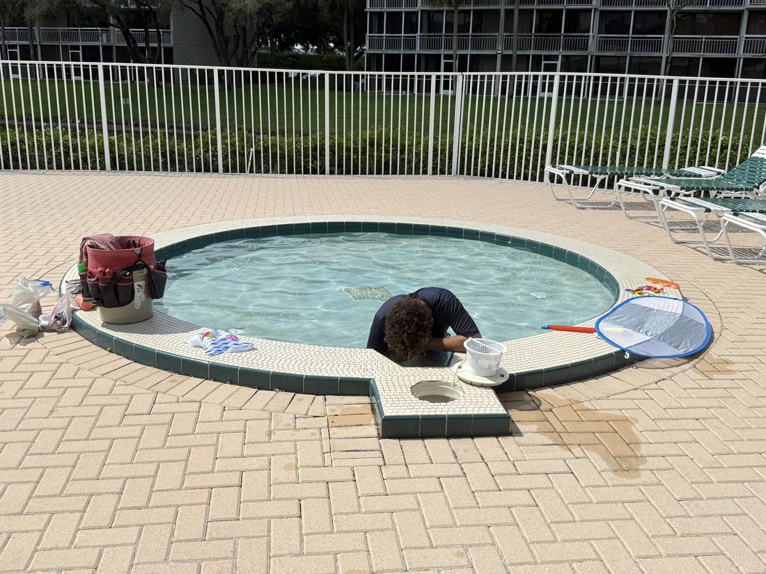 Leak detection underway at a community pool in Boca Raton