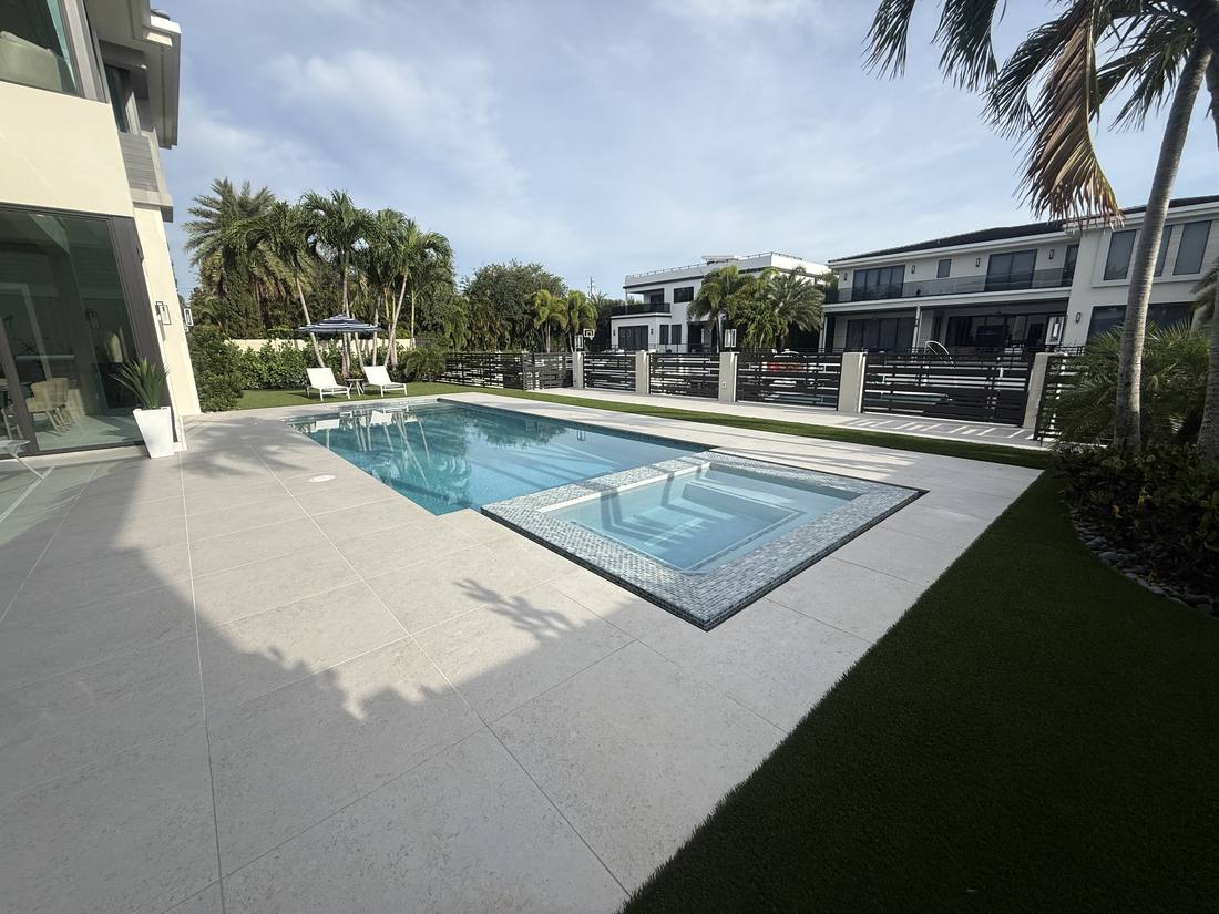 Rectangular pool and spa at a Boca Raton property