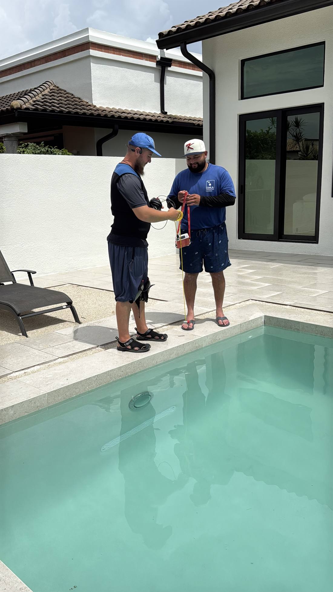 Leak and Subsurface Locators technicians and students during a training day at a Boca Raton pool