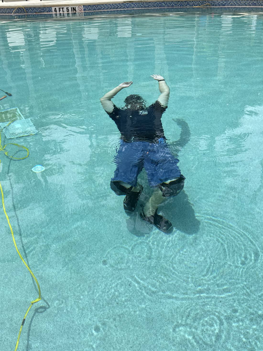 Underwater inspection of the pool wall and fittings at a North Palm Beach home