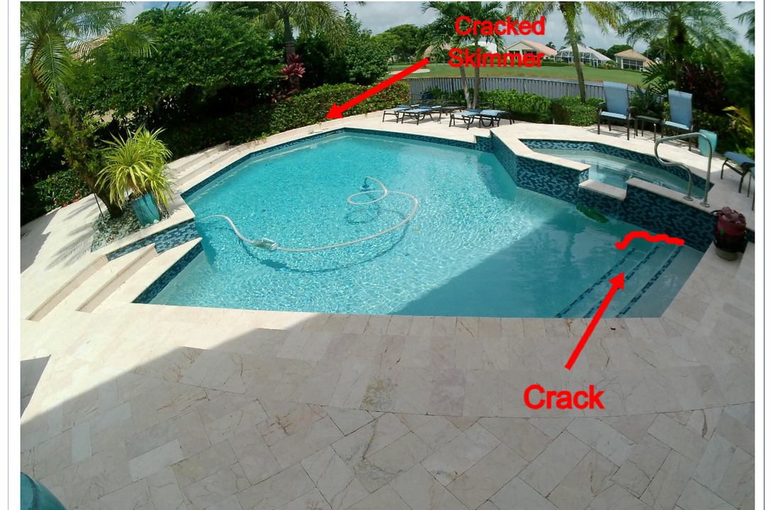 Cracked skimmer housing and a crack down the pool stairs, marked at a BallenIsles home in Palm Beach Gardens ahead of a renovation