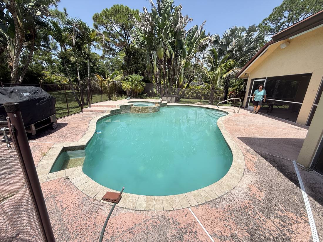 Pool and spa on a large lot in The Acreage